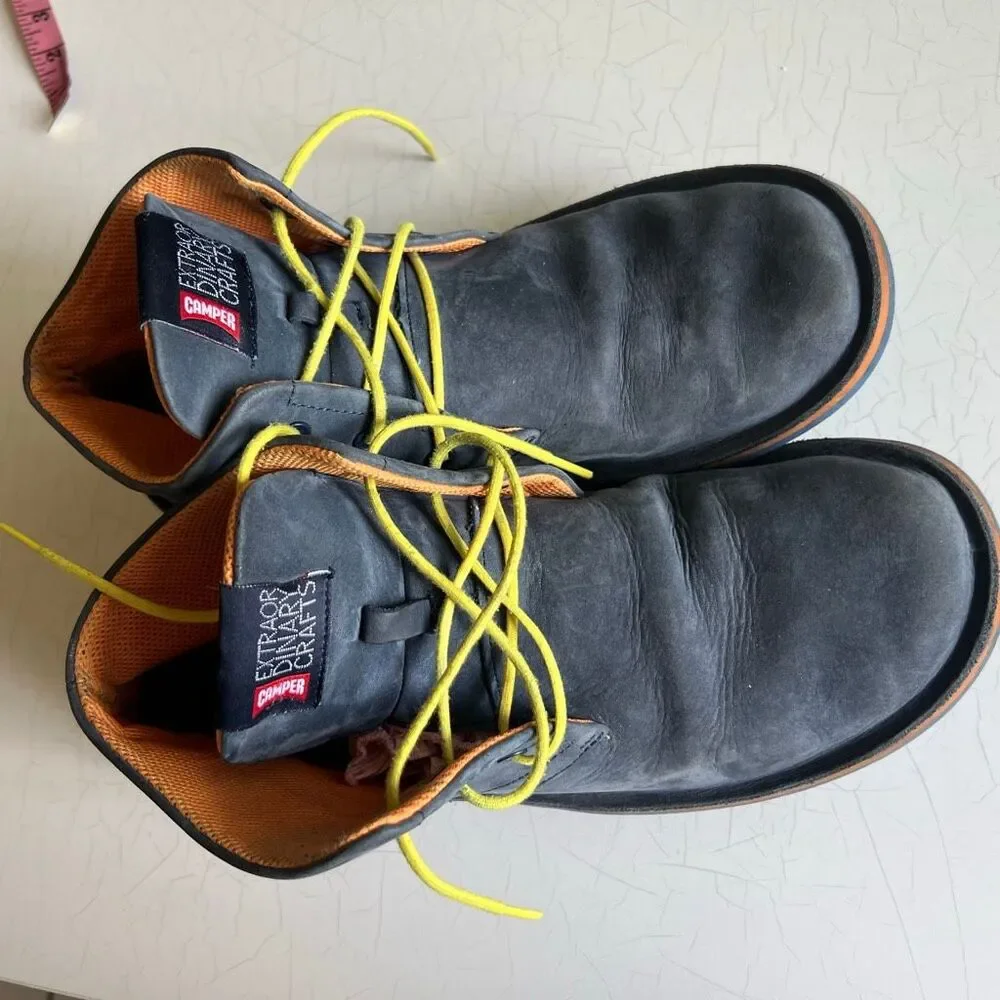 Camper Extraordinary Crafts chukka boots feature dark gray suede uppers and vibr
